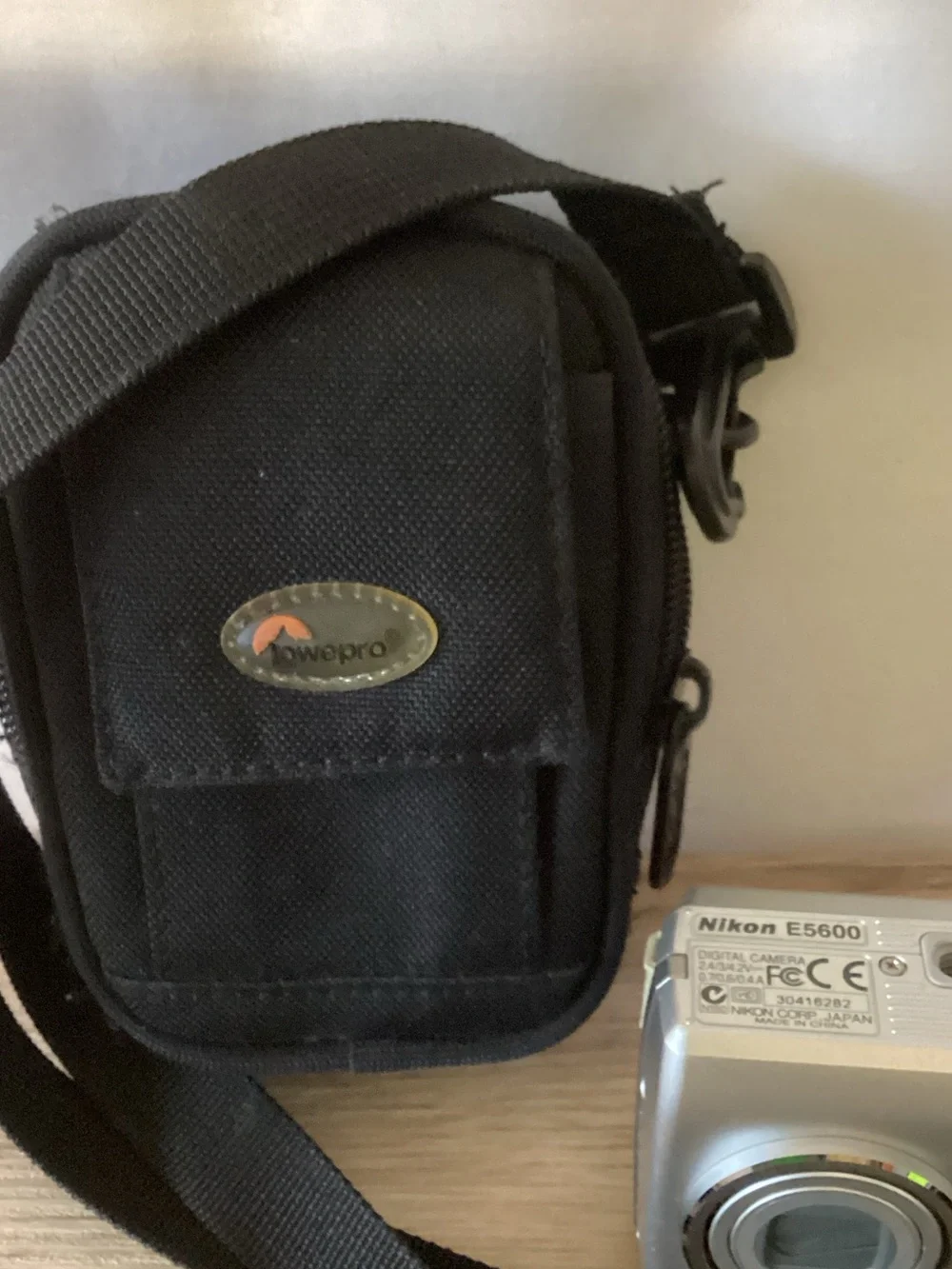 Nikon Silver Compact Digital Camera with Black Carrying Pouch